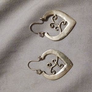 Silver earrings. About an inch long barely used